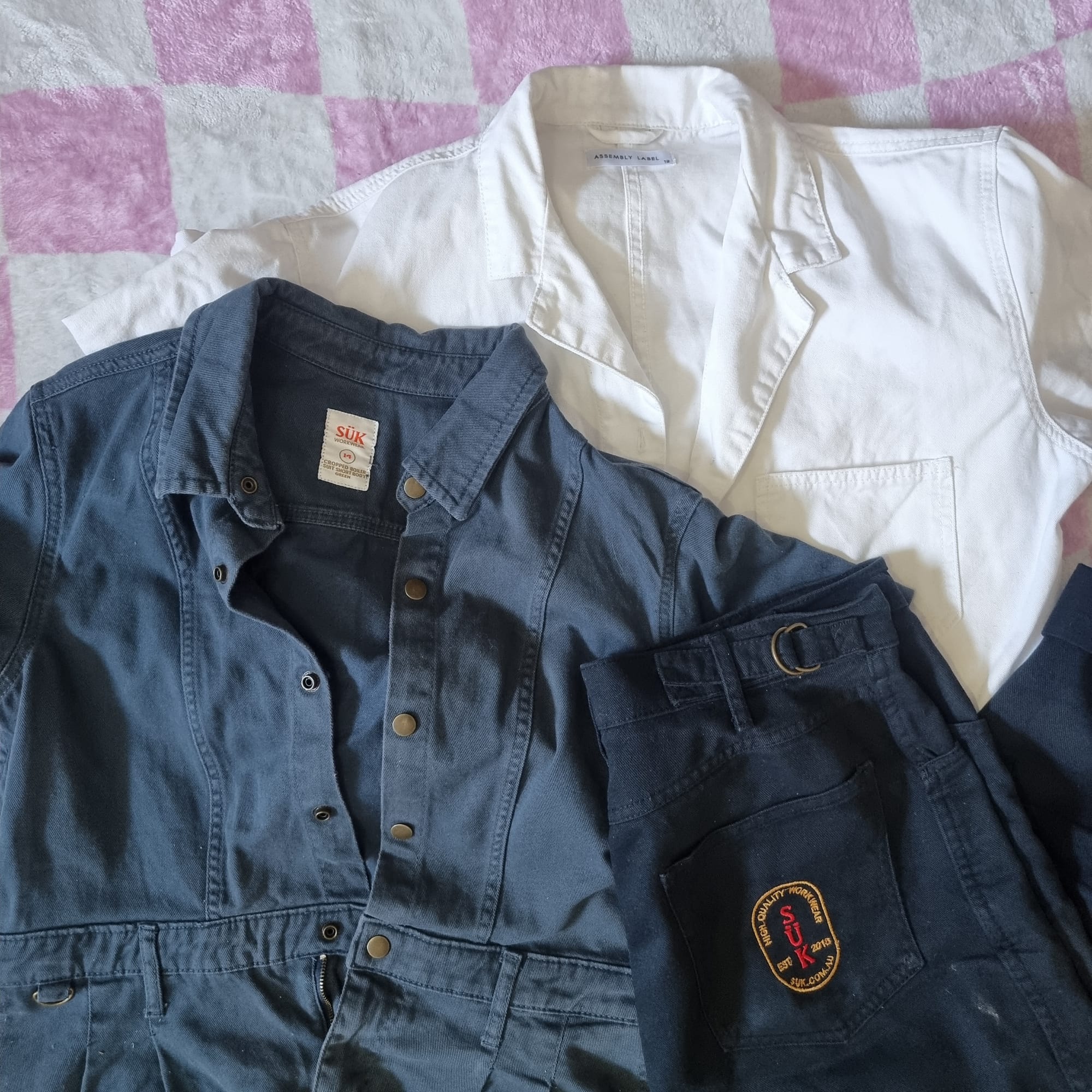 two thick denim rompers and a pair of denim workwear pants